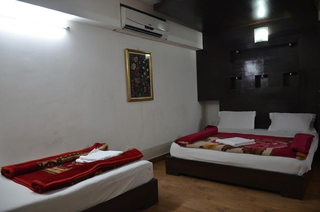 Hotel Durga International Új-Delhi Szoba fotó